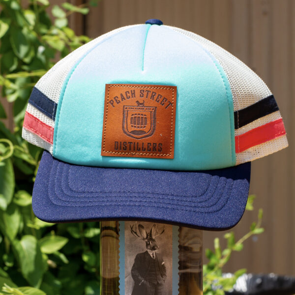 Alpine Camo trucker hat by Peach Street Distillers