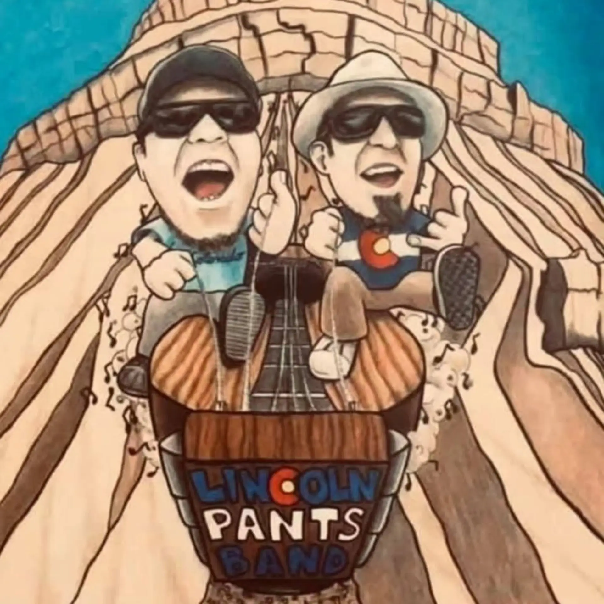 Cartoon of two men with sunglasses, hats, and goatees, riding in a barrel labeled Lincoln Pants Band down a wooden guitar neck set against canyon-like cliffs. Both are smiling, with arms raised in excitement, capturing the thrill of live music.